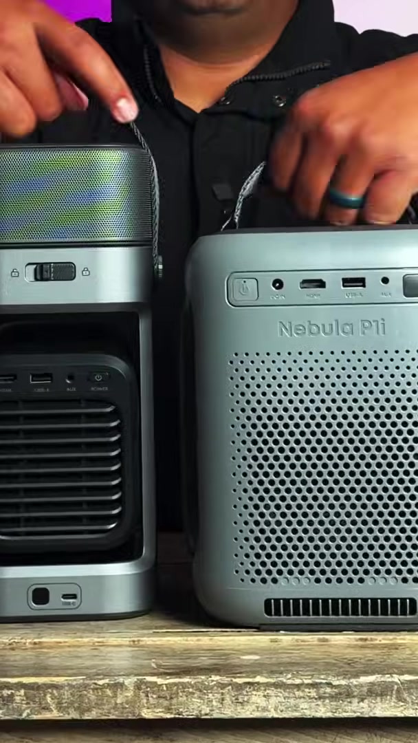 Pointing at the two units. Nebula P1i is printed on one body.