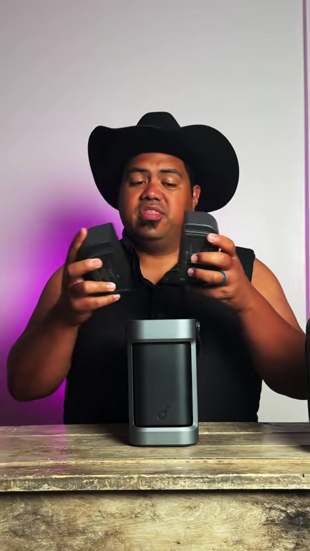 Holding the detachable speakers off the unit
