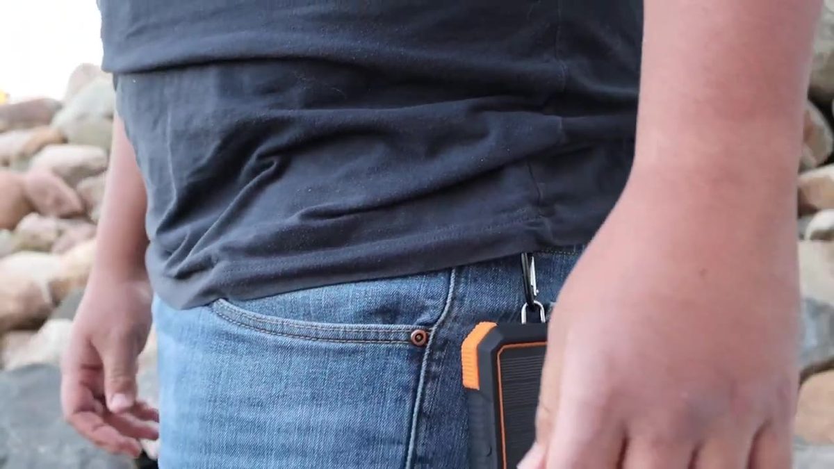 Blavor solar power bank clipped to jeans