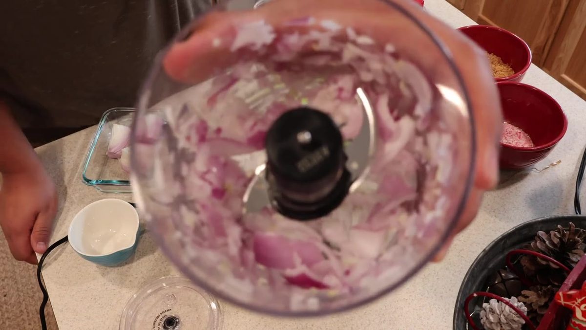 Chopped quarter onion in the 3-cup Stack & Press bowl
