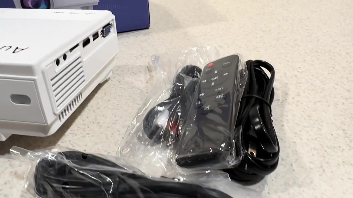 AuKing projector ports HDMI USB 3.5mm plus remote and cables