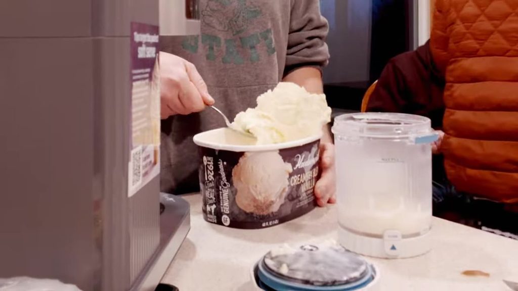 Store-bought ice cream scooped into a Creami pint
