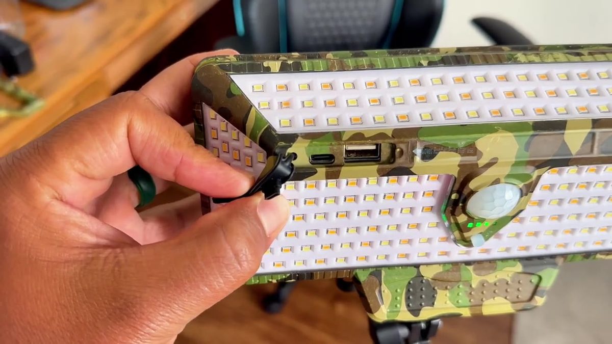 USB-C and USB-A ports with rubber flap on the solar camping light