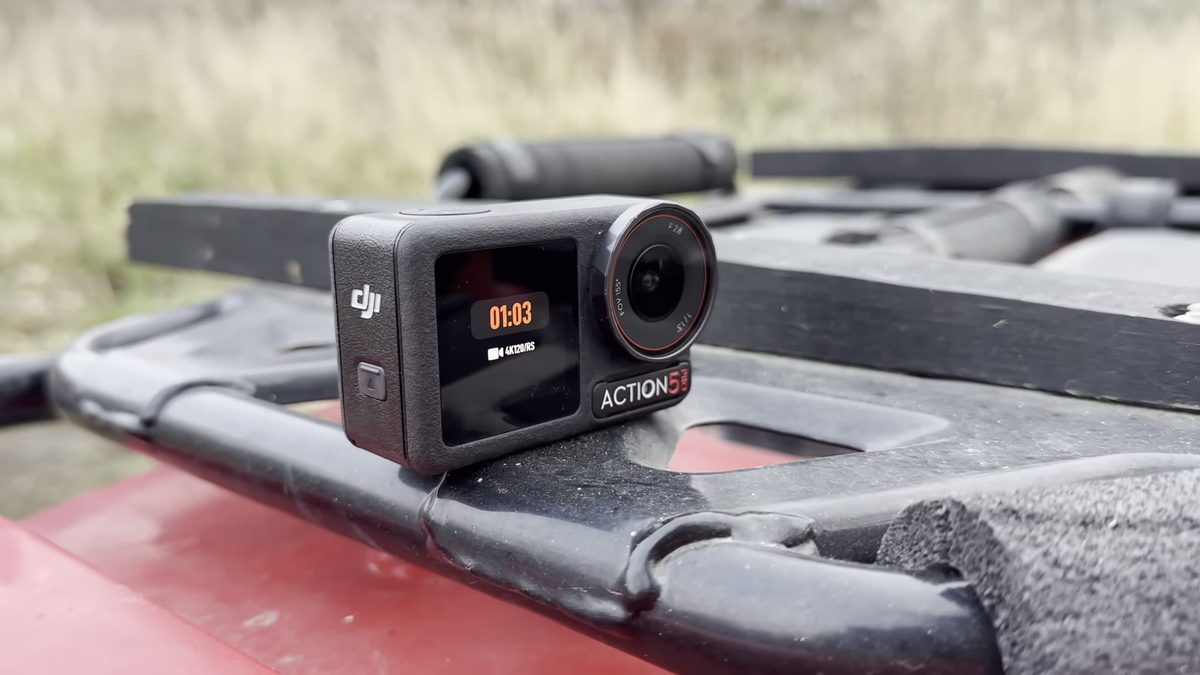 DJI Osmo Action 5 Pro on ATV rack showing ACTION 5 PRO screen