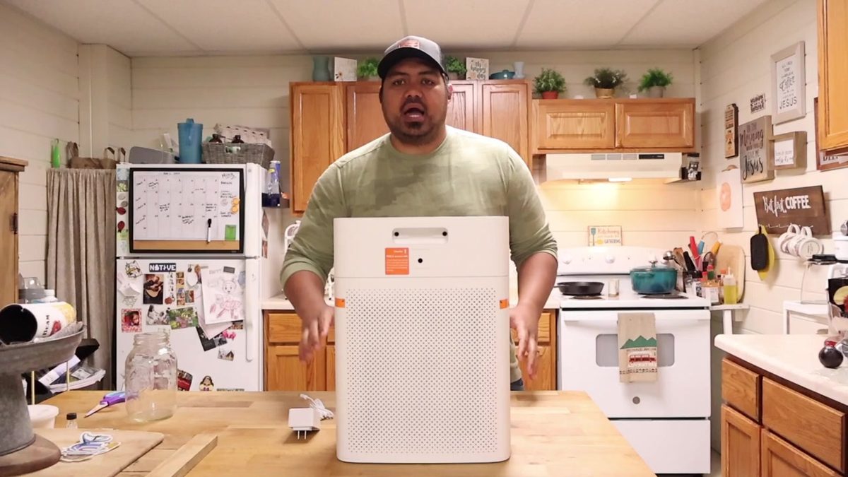 Morento HY4866 air purifier on a kitchen island table with the power brick beside it