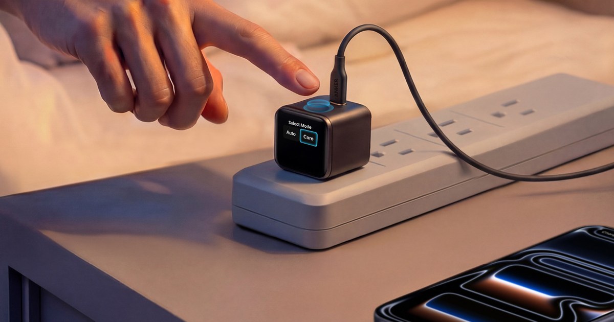 Finger tapping the Anker Nano Smart Display charger on a bedside power strip, screen showing Auto and Care modes